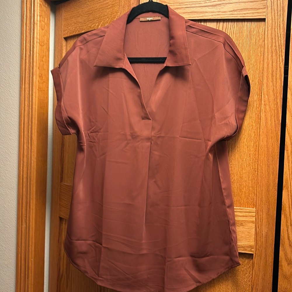 Never Worn. Cuff short sleeve blouse. Size M